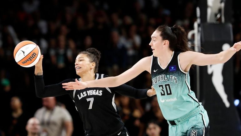 Las Vegas Aces forward Alysha Clark (7) picks off a...