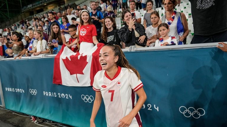 Canada's Julia Grosso celebrates her side's 2-1 win at the...