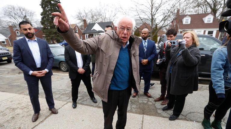 Democratic presidential candidate Bernie Sanders outside a polling site in...