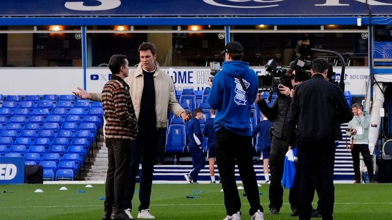 Wrexham co-owner Rob McElhenney, left, and Birmingham City co-owner Tom...