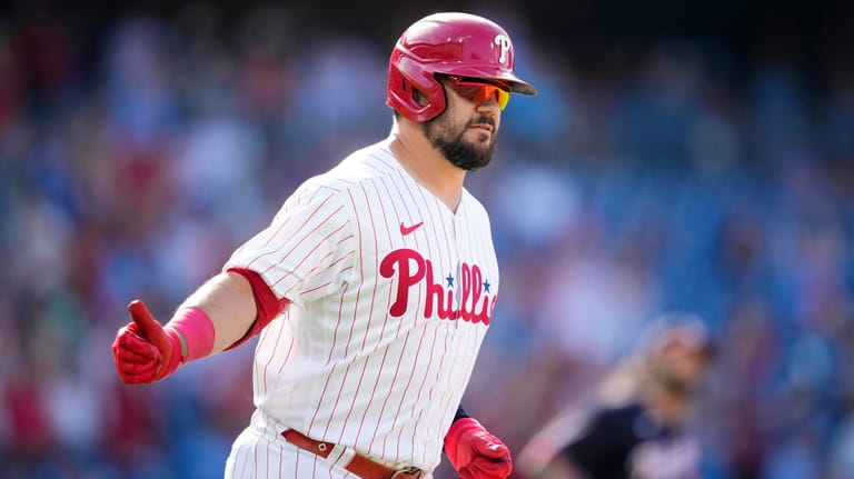 Schwarber homers twice to reach 30, Phillies top Nationals 8-4 in