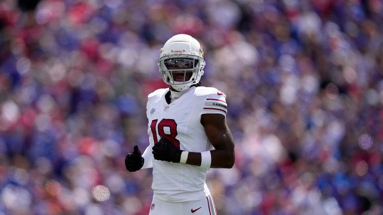 Arizona Cardinals' Marvin Harrison Jr. runs to the field during...