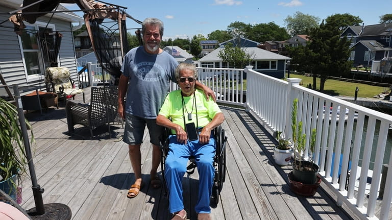 Danny D'Elia, left, with his father James in Amityville.