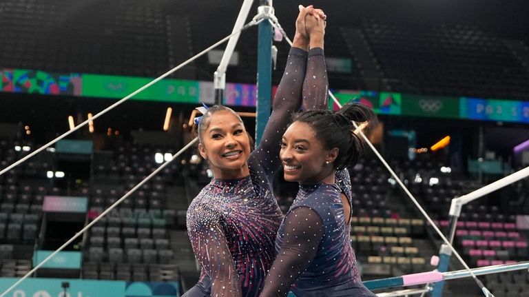 Jordan Chiles, left, and Simone Biles of the United States...