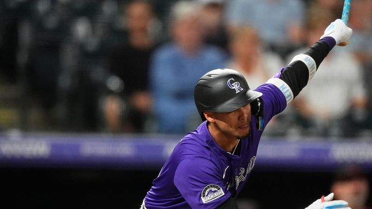 Colorado Rockies' Ezequiel Tovar singles off Arizona Diamondbacks starting pitcher...