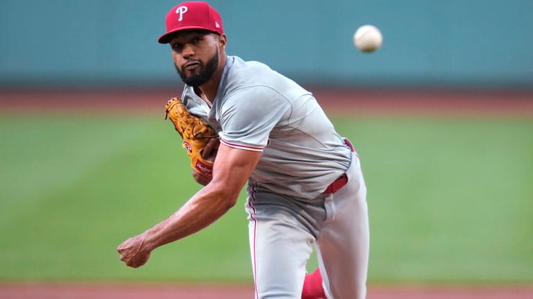 Philadelphia Phillies pitcher Cristopher Sánchez delivers during the first inning...