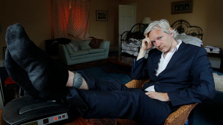 WikiLeaks founder Julian Assange is seen with his ankle security...