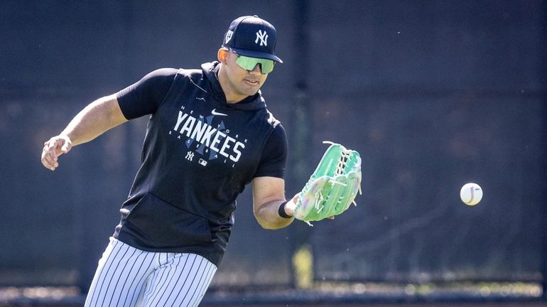 The Yankees’ Jasson Dominguez takes part in outfield drills during spring...