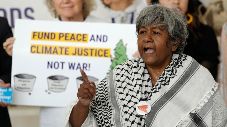 Azra Talat Sayeed participates in a demonstration advocating for peace...