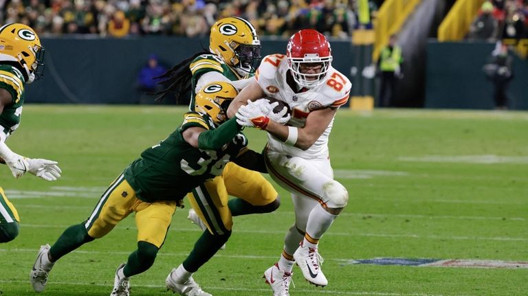 Kansas City Chiefs tight end Travis Kelce (87) runs after...