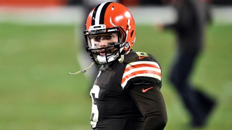 Browns quarterback Baker Mayfield reacts after the Ravens defeated the...