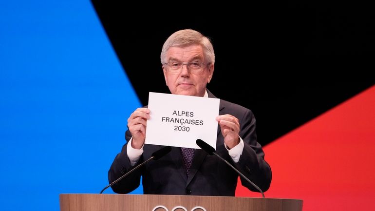 IOC president Thomas Bach announces that the French Alps was...