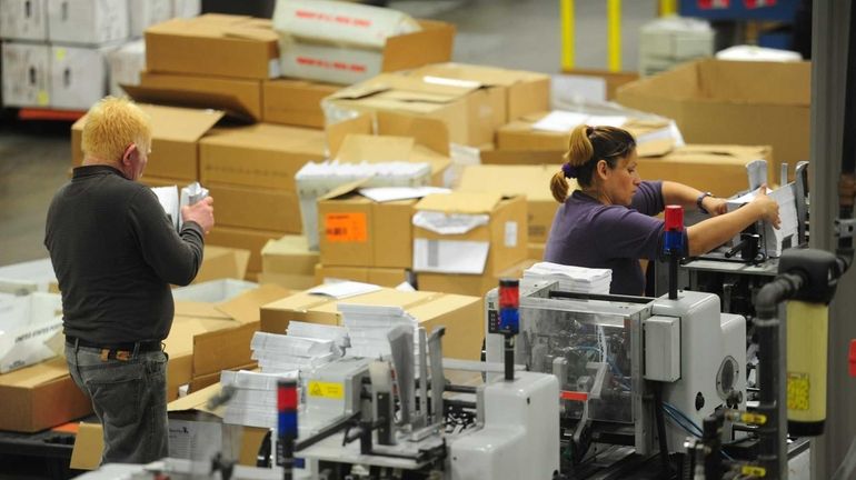 Inside the Broadridge Financial Solutions factory in Edgewood May 9,...