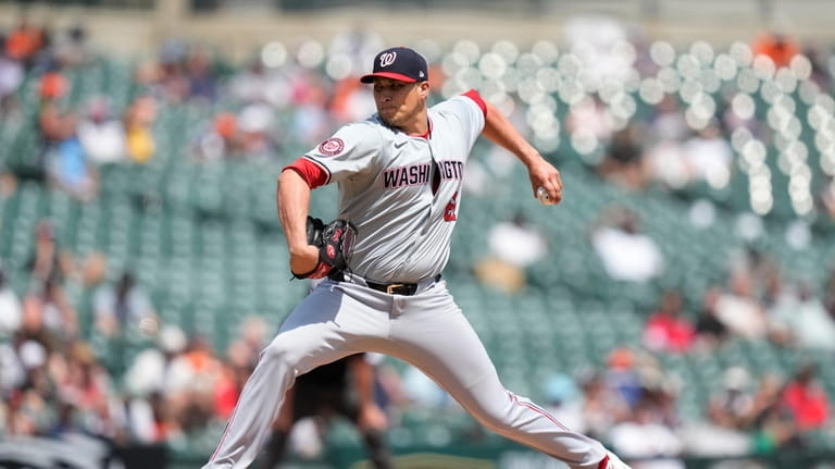 Washington Nationals pitcher Robert Garcia throws during the seventh inning...