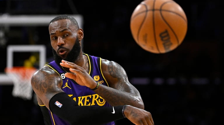 Los Angeles Lakers forward LeBron James passes the ball during...
