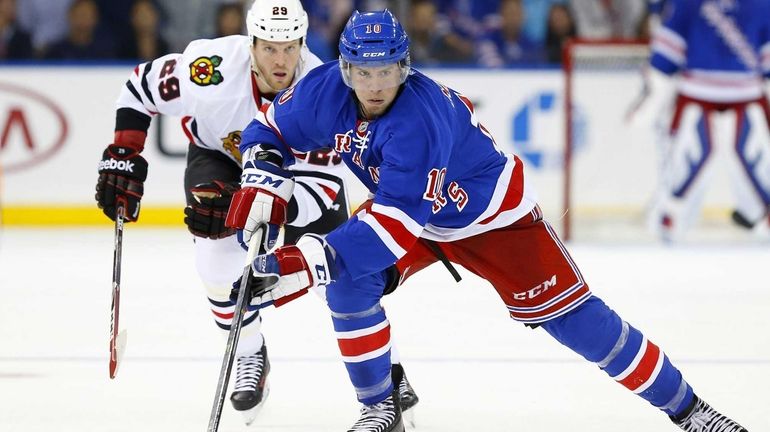 J.T. Miller #10 of the Rangers skates against the Chicago...