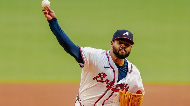 Atlanta Braves pitcher Reynaldo López throws in the first inning...