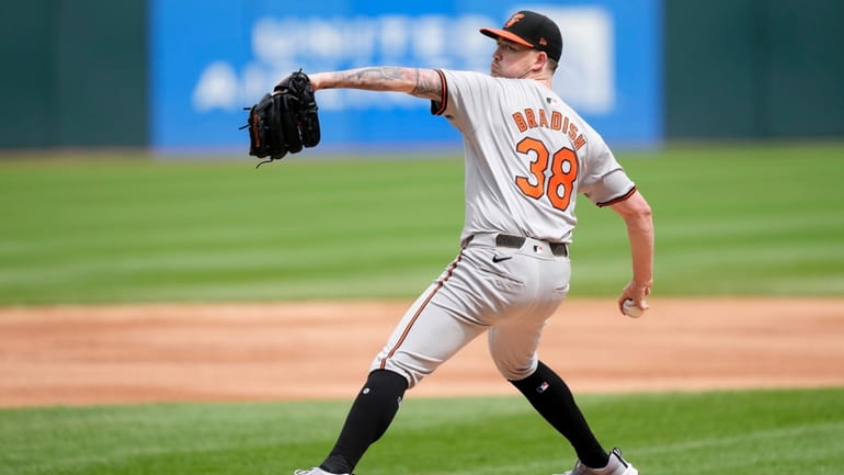 Baltimore Orioles starting pitcher Kyle Bradish delivers during the first...
