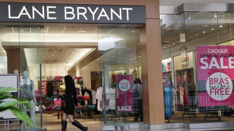 A woman walks into a Lane Bryant store in San...