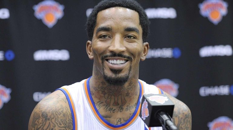 J.R. Smith talks to the media at the Knicks' media...