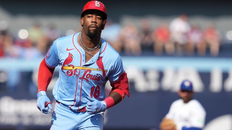 St. Louis Cardinals outfielder Jordan Walker (18) rounds the bases...