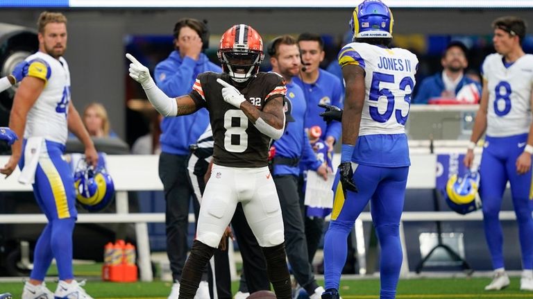 Cleveland Browns wide receiver Elijah Moore (8) celebrates after catching...