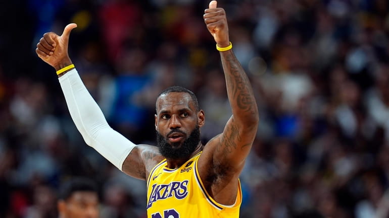 Los Angeles Lakers forward LeBron James gestures for a call...