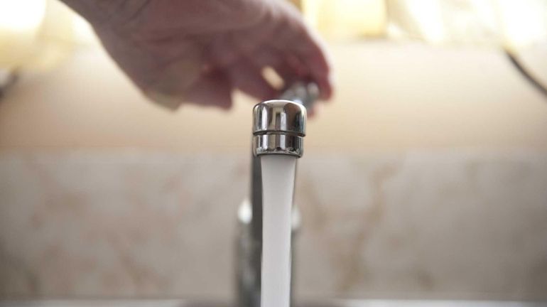 A photo illustration of water coming out of a tap.