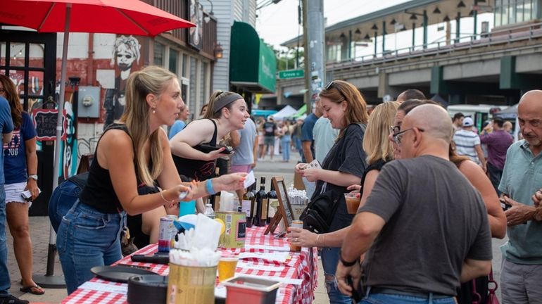 Uncle Frank's serves drinks at Thursday Night Live on Railroad...