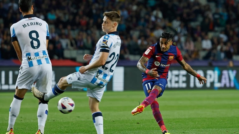 Barcelona's Raphinha shoots on goal during a Spanish La Liga...