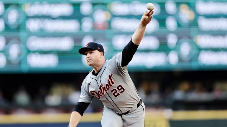 Detroit Tigers shortstop Javier Báez throws against the Seattle Mariners...