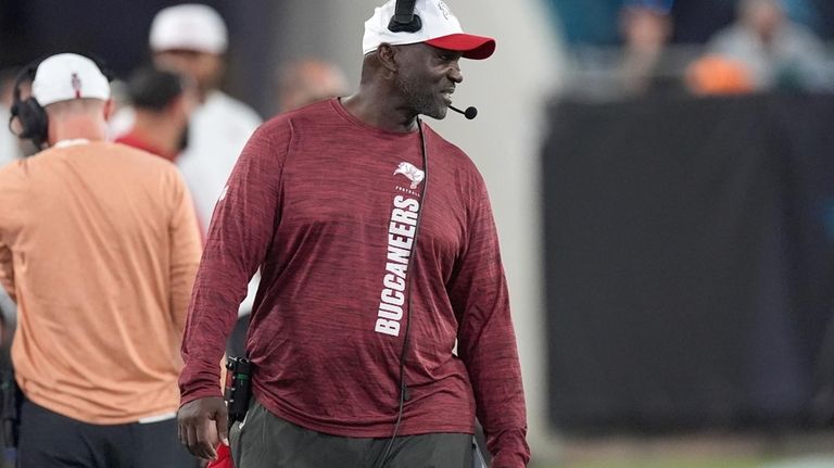 Tampa Bay Buccaneers head coach Todd Bowles paces the sideline...