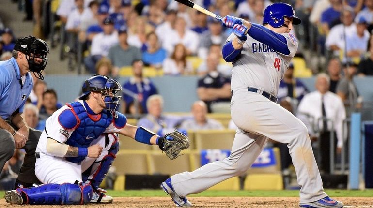 Anthony Rizzo #44 of the Chicago Cubs hits a two-run...