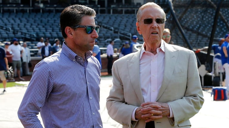 Mets COO Jeff Wilpon, left, and majority owner Fred Wilpon look on...