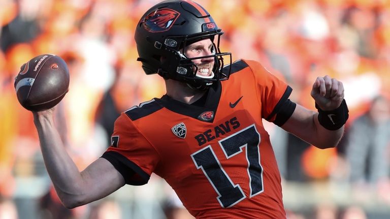 Oregon State quarterback Ben Gulbranson (17) drops back to pass...