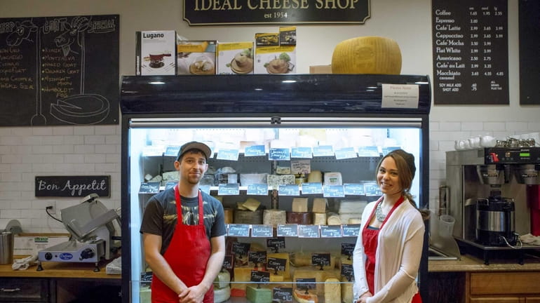 Cheesemongers Michael Roselle and Melissa Panarello stand in front of...