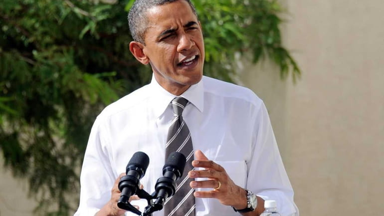 President Barack Obama speaks on the American Jobs Act October...