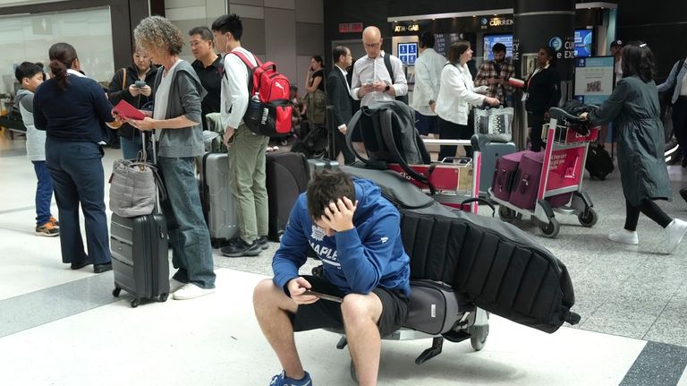 Porter Passengers wait at Toronto Pearson Airport on Friday, July...