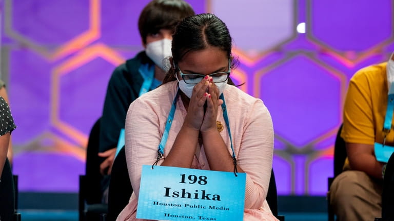 Ishika Varipilli, 11, from Spring, Texas, waits on stage during...