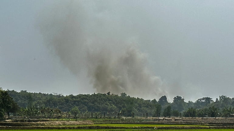 Smoke is seen bellowing from a Myanmar Border Police post...