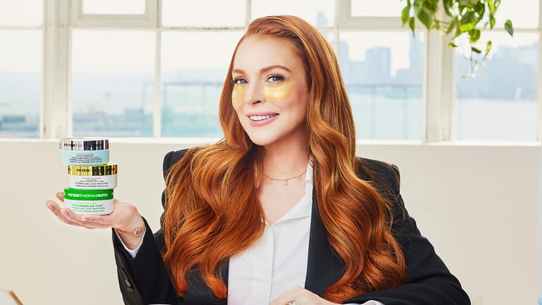 Lindsay Lohan promotes eye patches from Peter Thomas Roth's skin...