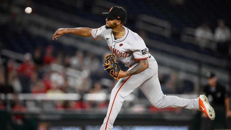 San Francisco Giants relief pitcher Camilo Doval throws during the...