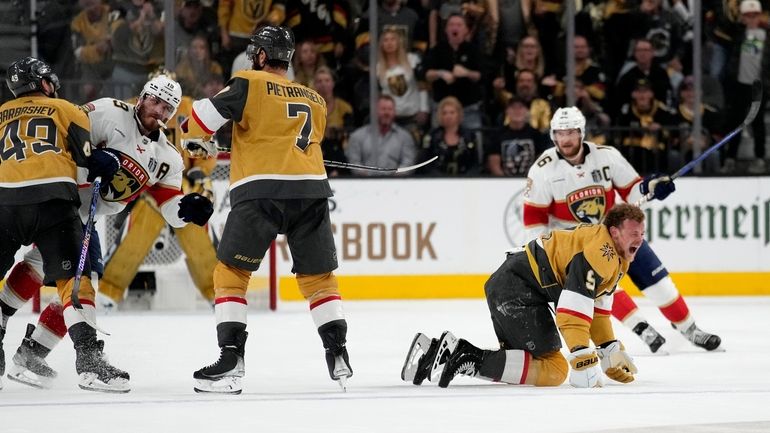 Vegas Golden Knights center Jack Eichel (9) yells after being...