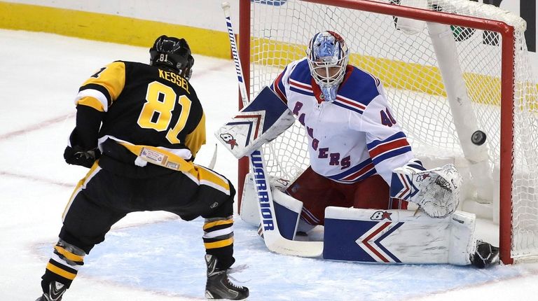 New York Rangers goaltender Alexandar Georgiev (40) blocks a shot...