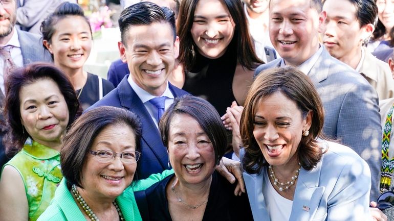 Vice President Kamala Harris takes a photo with Sen. Mazie...