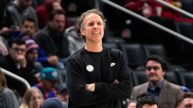 Washington Wizards interim head coach Brian Keefe watches against the...