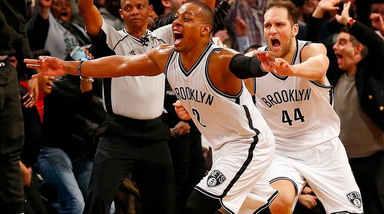 Randy Foye of the Brooklyn Nets celebrates his game-winning basket...