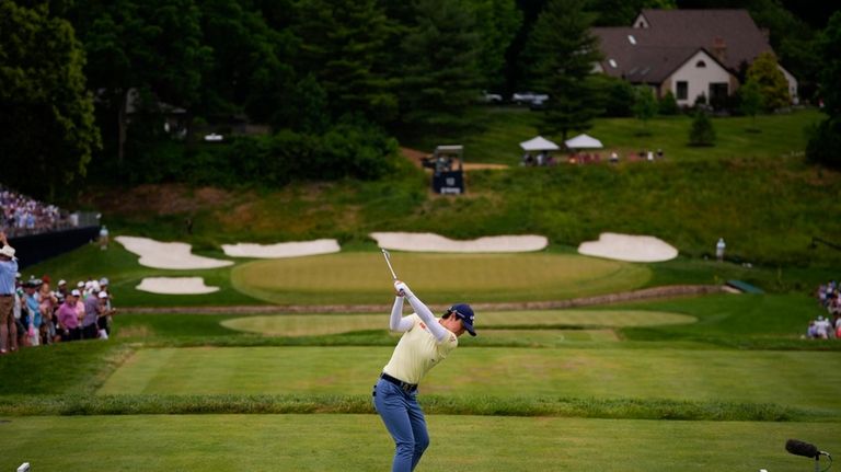 Yuka Saso, of Japan, hits off the 12th tee during...