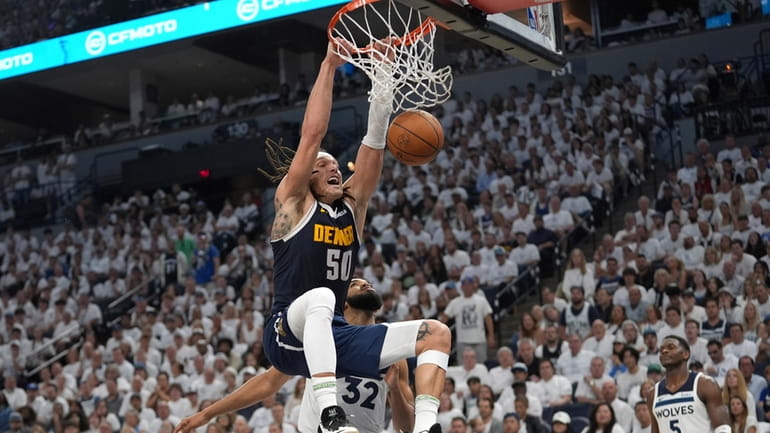 Denver Nuggets forward Aaron Gordon (50) dunks during the second...