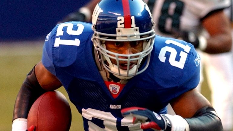 Giants running back Tiki Barber rang for 203 yards on...